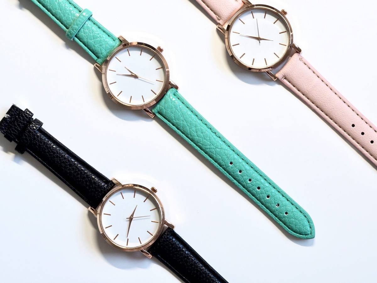 Close-up of textured watch dial color options showing light reflection differences