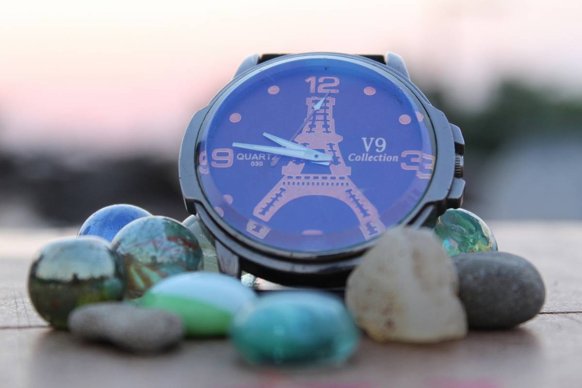 Side-by-side comparison of personalized watch colors on stainless steel and titanium cases