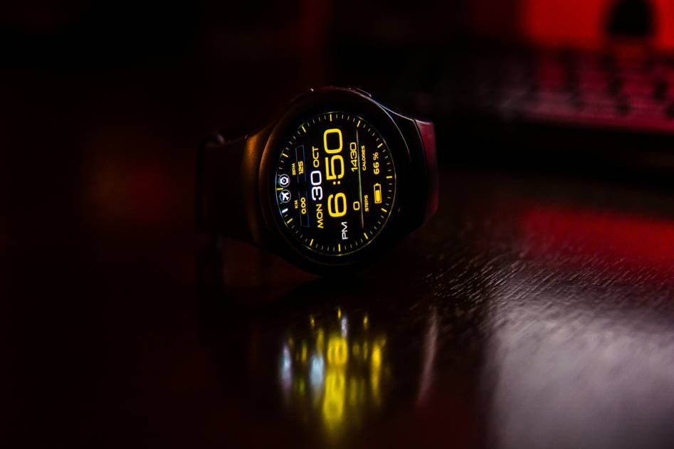 Sleek wristwatch showcasing metallic silver, navy, and gold color accents